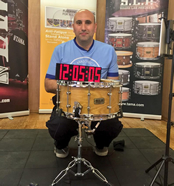 Jayson Brinkler, an eight time DCUK champion and snare drummer with the Dagenham Crusaders and Blue Eagles, broke the Guinness World Record on Saturday 16th May in Dartford - England to beat the world's longest individual drum roll of 12 hours and 3 seconds, to set a new record time of 12 hours, 5 minutes and 5 seconds. 
