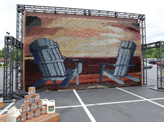 Hundreds of shoppers and guests at 21 LOWE'S® locations across the Midwest and east coast helped to build the 350-square-foot mosaic as part of the Olympic Maximum stain tour.