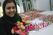 largest display of handmade paper dolls world record set by Amnah Al Fard