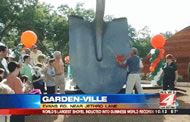 The World's Largeest Shovel, built by Garden-Ville, is 40 feet tall, weighs more than 5,000 pounds and is made entirely of recycled wood and metal. 
