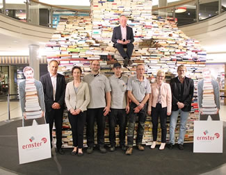 Luxembourg bookstore chain Ernster has won a World Record for the largest book pyramid, built from 63,377 hardcovers and paperbacks. Over eight weeks a group of Ernster staff worked on building the pyramid, which eventually measured 4.5 times 3 metres.