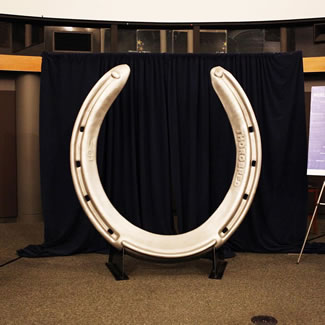 The Kentucky Derby Museum unveiled the world's largest horseshoe; the shoe measures 6 x 9 x 6 x 11 feet, weighing in at a whopping 610 pounds. 