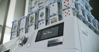  Bryan Berg, a world-record holder in card stacking, constructed a 48-story house with 10,800 cards on LG's Centum washing machine, setting a new world record. 