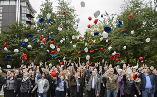 A group of 110 lucky lottery winners from across the UK beat the existing record of 100 lottery millionaires gathered together in one place to become the 'largest gathering' in the world. 