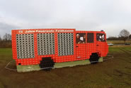  A group of volunteer firefighters have set their sights on breaking a Guinness World Record for the largest fire engine made out of beer crates. Nearly 5,000 beer crates were used to build the 15m long fire engine which stands at 5m tall.