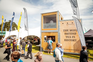 The biggest tea-chest in the world was making its debut at the Royal Cornwall Show yesterday. The giant chest is actually made of three units and now acts as Tregothnan Estate's new hospitality suite with sweeping views of the the show's main show ring. Each of the three units contains enough room to store the entire UK's tea needs for one day.
