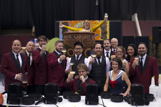 Porco Lounge & Tiki Room set the new record for crafting the World's Largest Daiquiri at 95 Gallons. Using 80 bottles of Appleton Estate rum, simple syrup, lime juice and ice, the tiki bar tasked four mixologists and a team of barbacks to man four 1.5 gallon Vitamixes until the giant Tiki mug was filled.