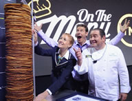 In celebration of the upcoming premiere of the new cooking competition series On the Menu, TNT has broken a GUINNESS WORLD RECORDS(R) record for the World's Tallest Pancake Stack. The epic pancake stack reached 87.4 cm (approximately 34.4 inches), surpassing the previous Guinness World Records' record of 87 cm.