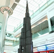 Dubai International has unveiled the world's tallest structure in chocolate, a 44.2 feet tall model of the world's tallest skyscraper Burj Khalifa. The chocolate replica tower, a creation of the master chocolatier Andrew Farrugia, was unveiled at Dubai International Airport as part of celebrations for the 43rd UAE National Day.