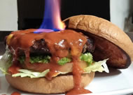 : A Washington, Iowa smokehouse owner has created the world's hottest burger. Xtreme Smokehouse and Grill owner Loren Gingrich says his newest creation, the 