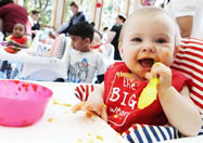 In a bid to expose babies to new tastes and healthy foods, Ella's Kitchen circulated 350 pouches of its organic meals to the more than 150 babies who attended the world's biggest wean.