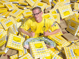 Petr Bauer, 27, from Germany has set a new World Record for his winning 13 boxes in one minute at the weekend's world pizza-box-folding championship. The previous world record was 12 boxes in one minute.