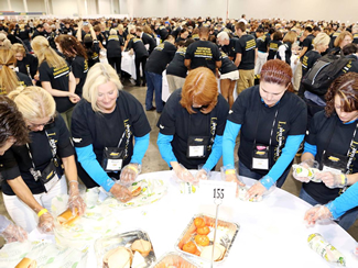 Members of Team SUBWAY make sandwiches as SUBWAY Restaurants sets a new World Record title for most people making sandwiches simultaneously with 1,481 people from around the world participating, during an event held as part of the 2015 SUBWAY Convention and the brand's 50th anniversary celebration at The Venetian Resort Hotel Casino on Saturday, Aug. 1, 2015 in Las Vegas