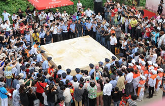 An eight ton tofu was unveiled at a cultural festival in Huainan, central China. The World's Largest piece of tofu measured close to 12 feet by 12 feet and was just over a foot tall.
