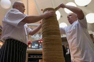 Center Parcs Sherwood Forest in Rufford, Newark, UK has racked up a mouth-watering World Record title for the Tallest stack of pancakes. Center Parcs' group executive chef, James Haywood, and executive sous chef, Dave Nicholls, assembled the pancakes into a freestanding structure over a nerve-jangling 45 minutes.