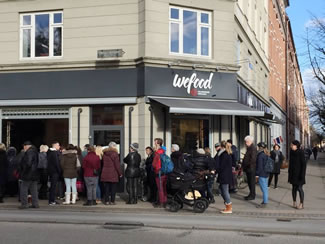 WeFood, a new supermarket in Copenhagen, has prices up to 50% lower than any other grocery store in the city. The food is past its official expiry date or has damaged packaging that would've caused it to be thrown away at a regular store. 