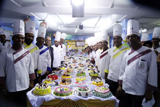 More than 100 students worked for 96 working hours to make the 506 diffrent cakes, using 350 kilos of flour, 150kg of sugar, 80 trays of eggs, 50 kilos of dark chocolate and no less than 143 other ingredients! 