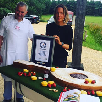  Great British Bake Off winner Frances Quinn has created the world's biggest Jammie Dodger style biscuit. The master baker from Market Harborough teamed up with Hambleton Bakery, from Exton, Rutland, to produce the 4ft 2 inches (127cm) long monster which weighed in at 26.76 kg.