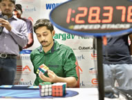 Bhargav Narasimhan, 22, an Indian student from the southern city of Chennai, has set a new Rubik's Cube record by solving five of the puzzles in just over a minute using only one hand; he achieved the feat in 1.23.93 minutes at an event in the city, breaking the existing Guinness World Records record of 1.52 minutes and setting the new world record for the Fastest time to solve 5 Rubik's cubes using one hand.
