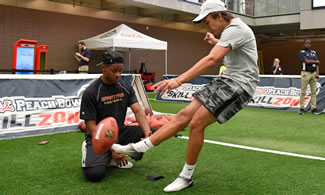 Roswell High kicker Parker Hannon has kicked the most 20-yard field goals in 60 seconds of any other person. The new record is 31. Hannon broke the the previous world record of 28, which was set by Adam Vinatieri during Super Bowl week back in February. He broke the record at the College Football Hall of Fame surrounded by supporters.