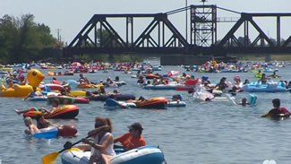 The Welland Canal was dotted with water inflatables of all kinds. Pizza, donuts, swans and family loungers, approximately 2,000 people made it out to be a part of this once in a lifetime opportunity.