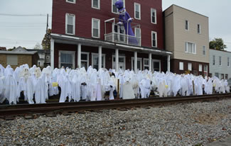 A total of 281 people drapped in white sheets gathered at the Grand Midway Hotel, setting the new world record for the Largest gathering of people dressed as ghosts, according to the World Record Academy.