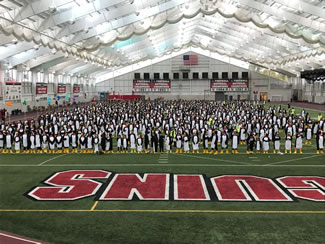 A total of 972 Youngstown State University students, alumni and community members gathered on the school's campus in their best penguin finery to celebrate the school's 50th anniversary as a university and to set the new world record for the Largest gathering of people dressed as penguins, according to the World Record Academy.  