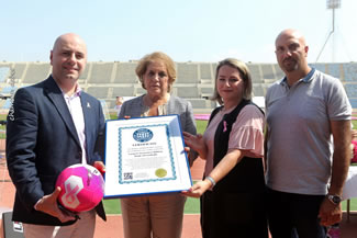  Handing of the WRA certificate to the First lady and Minister by the lawyer and the topographer.