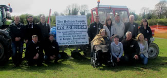 All 15 of the Holton Siblings 13 brothers and 2 sisters about to set off on their world record attempt.