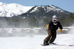 longest distance towed on snowboard Jason Buchanan