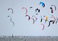  An "armada" of 352 kitesurfers in southern Spain breaks the Guinness World Records record for the largest kitesurfing parade across one nautical mile.