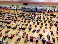 The World Record for the largest group doing sit-ups simultaneously for one minute was officially set on Thursday, Feb. 5, 2015, at Gateway YWCA in Winston-Salem. Red H.E.A.R.R.T organized the record-breaking event, which included a total of 414 Winston-Salem/Forsyth County community participants as well as Winston-Salem Mayor Allen Joines completing the attempt successfully.