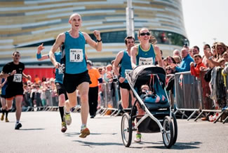  A mum and her eight-and-a-half-month-old baby smashed a world record when they completed Derby's Ramathon. Lindsy James became the fastest person to ever complete a half-marathon while pushing a pram, which held her son Archie. The pair smashed the record for the 13.1-mile distance by more than three minutes and Mrs James was delighted by her achievement.