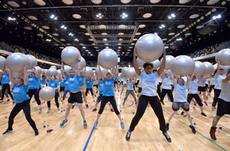 More than 391 participants joined in the 30 minute class to break the world record and make exercise ball history.