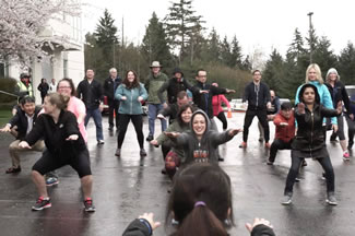 Fujifilm Manufacturing USA Inc. employees took part in a five-location effort to set a Guinness World Record for most people doing squats for for one minute. The record breaking was part of the Fuji Fit wellness initiative at the company.