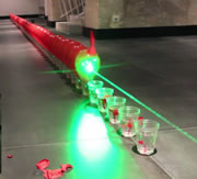 longest line of baloons popped with a laser pointer