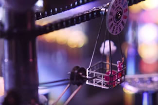 The World's Smallest Rube Goldberg machine is composed of 1200 mechanical watch parts, the smallest being less than a millimeter in size.