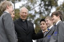 oldest working teacher world record set by Father Geoffrey Schneider