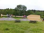 GOLDEN, B.C., Canada -- The World's Largest Paddle is scaled 13 times larger than an actual oar, standing 2.8 metres (9 feet) high, 18 metres (60 feet) long and weighing 2,400 kg (5,300 pounds); it is located 26 kilometres from Golden, in Parson, on a farm on Highway 95 owned by Mark Teasdale, according to the World Record Academy: http://www.worldrecordacademy.com.