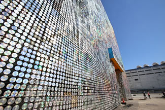 The old factory was covered in exactly 489,440 glittering CDs setting a World Record of the 