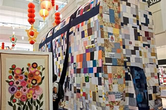 THE WORLD'S largest holdall bag, which took 1,492 people six months to put together, is being exhibited in Ipoh. Sewn together using 2,984 old t-shirts, the 7.62m long, 3.04m wide and 5.44m high, the world's biggest replica bag is part of a sewing exhibition being held at the Ipoh Parade Shopping Mall.