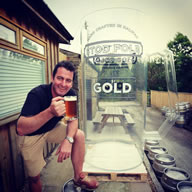 Angus Wood at the Stod Fold Brewing Company, Ogden celebrates the world record for world's largest glass of beer.
