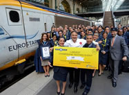 European rail service Eurostar began its 20th anniversary celebrations yesterday (9 October) by setting the World Record for the largest Champagne tasting event. The stunt was attended by TV chef Raymond Blanc, who is Eurostar's business premier culinary director. He and his sommelier from restaurant Belmond Le Manoir aux Quat'Saisons, Arnaud Goubet, joined passengers on the 10:25am service from London St Pancras to set the record. Travellers in all classes were served three types of Champagne to sample and a slice of Opera cake. An official Guinness World Records adjudicator announced that the record had been broken, with a total of 515 travellers taking part