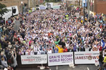 1232 people stomped 60 tons of Concord grapes to set a World Record for the most people grape stomping blocks from the Lucy Desi Center for Comedy, in Jamestown, New York, on Saturday, October 11, 2014. Lucille Ball, who was born in Jamestown, New York, performed the now iconic grape stomping scene during an episode of I Love Lucy in 1956. 