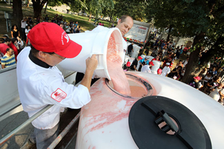  McGill University sets another World Record; this time, for the World's Largest Smoothie! The 3,121 litre drink was filled with fair trade bananas, Quebec grown raspberries, strawberries, blueberries, Macdonald Farm melons, Danone yogurt, and Minute Maid Juice. Over 4 hours, students, staff, and volunteers helped chop, blend, and prepare the record-breaking beverage.