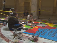 Photo: The World's Largest M&M Mosaic display is set up in the Idaho statehouse and is made up of more than 70,000 candy pieces. It took Jackson McKenzie, along with his friends and family, six days to complete. 
