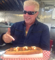 Vancouver, Canada -- The $100 "Dragon Dog", made at DougieDog Hot Dogs food truck in Vancouver, Canada, is soaked in Louis the 13th cognac, which costs $2,000 a bottle; It is then topped with Kobe beef, fresh lobster and picante sauce; it'll set diners back $100 - setting the new world record for the Most expensive hot dog, according to the World Record Academy: www.worldrecordacademy.com/.