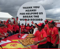 Hungry Lion set a new World Record for the largest serving of fried chicken ever. To celebrate Heritage Day, over 1.6 tonnes (1,631.216kg) of free chicken was served to Mitchells Plain residents. 