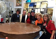 Using a kiddie pool as a mould for melted chocolate and peanut butter, the Candy Factory have made the world's largest peanut butter cup. The owners told local media they used more than 440 pounds (199.5kg) of ingredients, which would reportedly beat the previous world record by 190 pounds.
