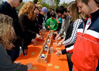 Tyler Krenzelok, Paul Jenkins and James Schrack, co-founders of Fort Collins Specialty Foods and the chocolate-filled marshmallow Stuff'n Mallows, gathered in a CSU parking lot along with hungry community members to set the Guinness World Record for 